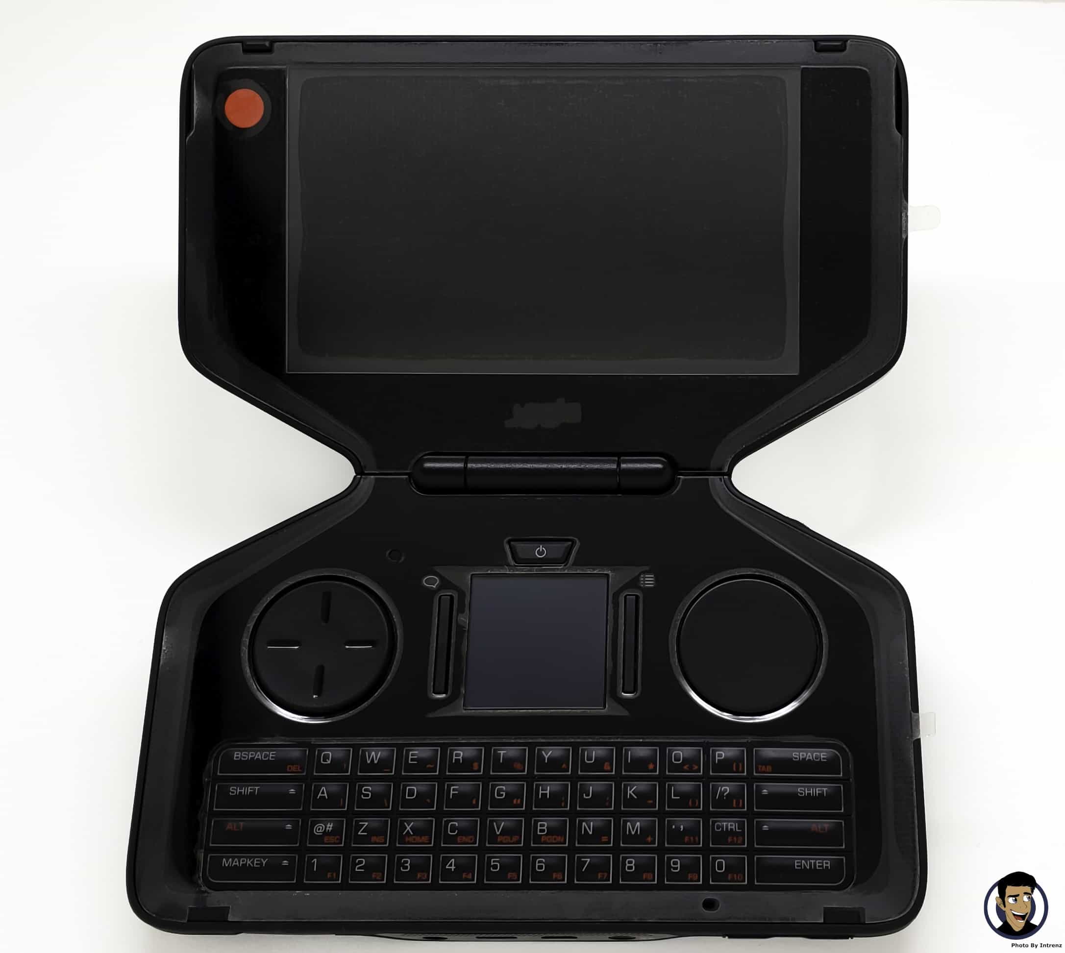 The Panasonic Jungle, folding handheld with the display on the top half and a keyboard, d-pad and track pad on the lower half.